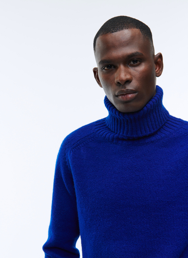 blue roll neck sweater